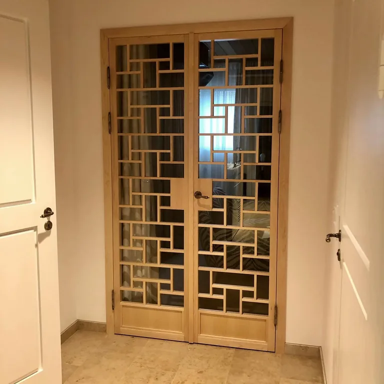 Custom interior doors project in Wood Lattice Glass Double Interior Doors by RPGroup